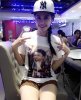 truong_quynh_anh_mac_ao_in_hinh_con_cho_do_nho_20_4__jpg0_have_logo_.jpg